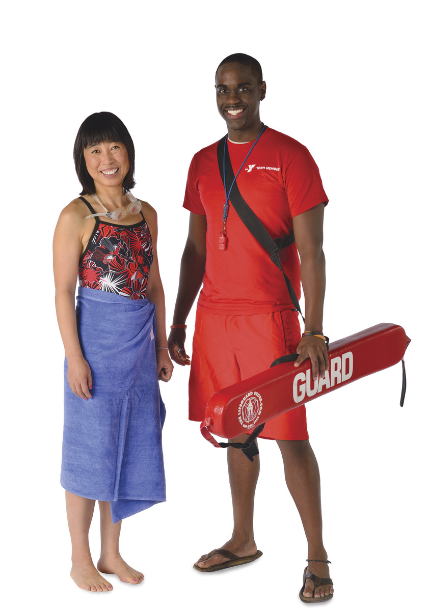 Lifeguard and member posing for picture.