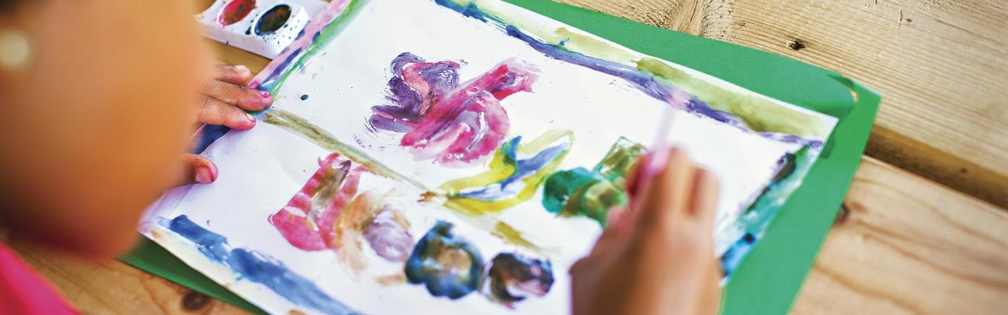Little girl painting