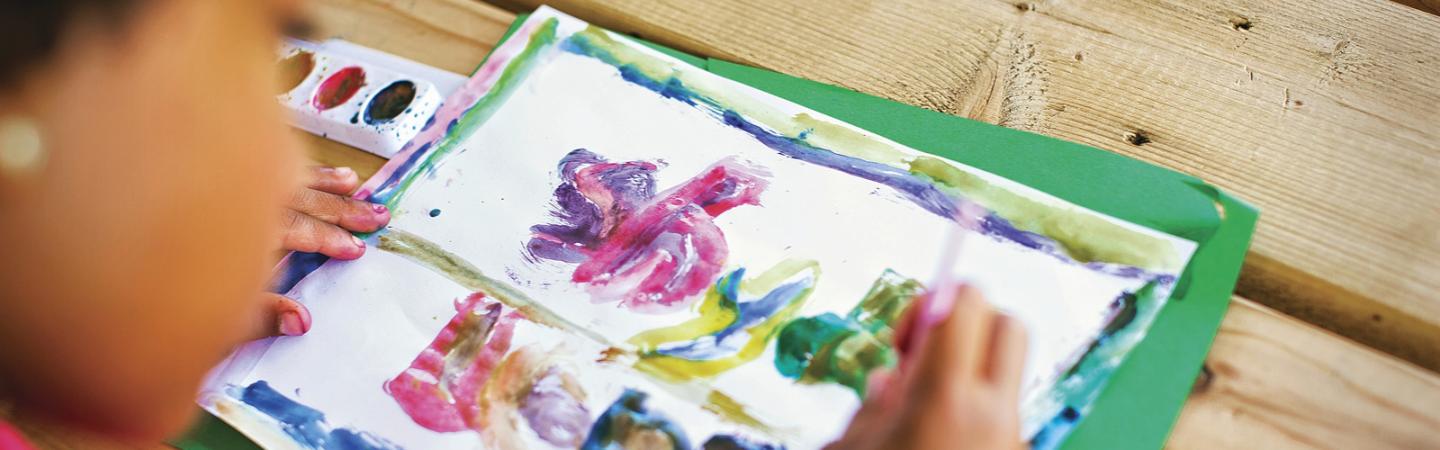 Little girl painting