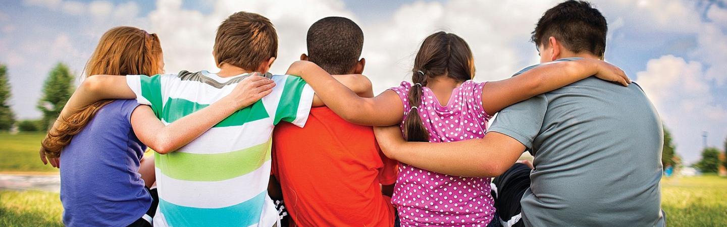 Children hugging each other.