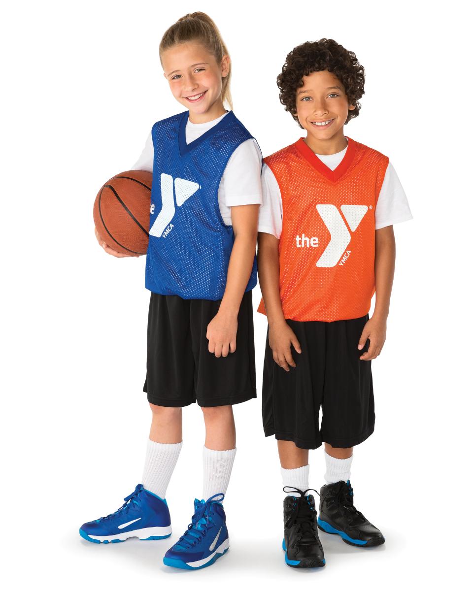 Boy and girl with basketball.